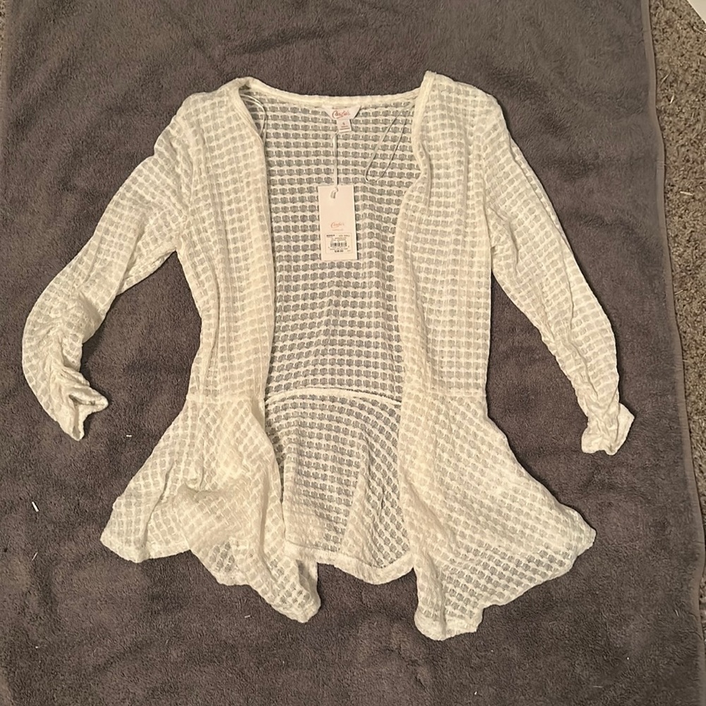 White cardigan in size small.